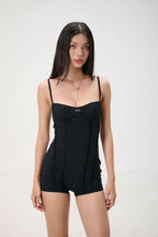 NAOMI PLAYSUIT.
